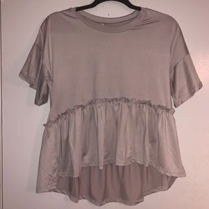 Dusty purple short-sleeved blouse.